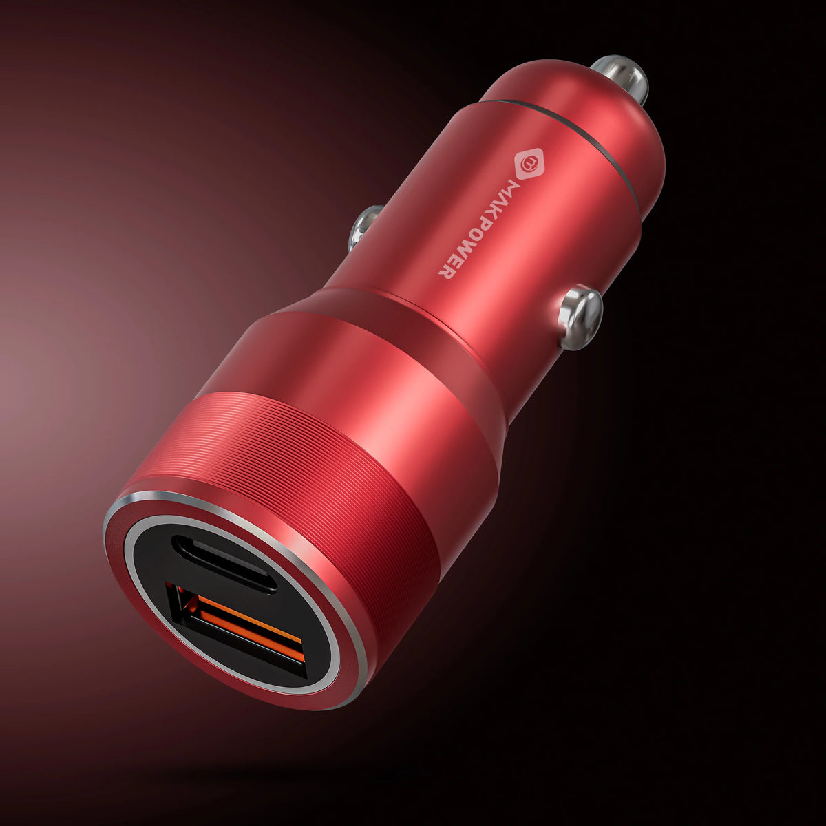 A red metallic car cigarette lighter charger with a USB-C port, featuring the brand name 'MAKPOWER' printed on the side, set against a dark gradient background.